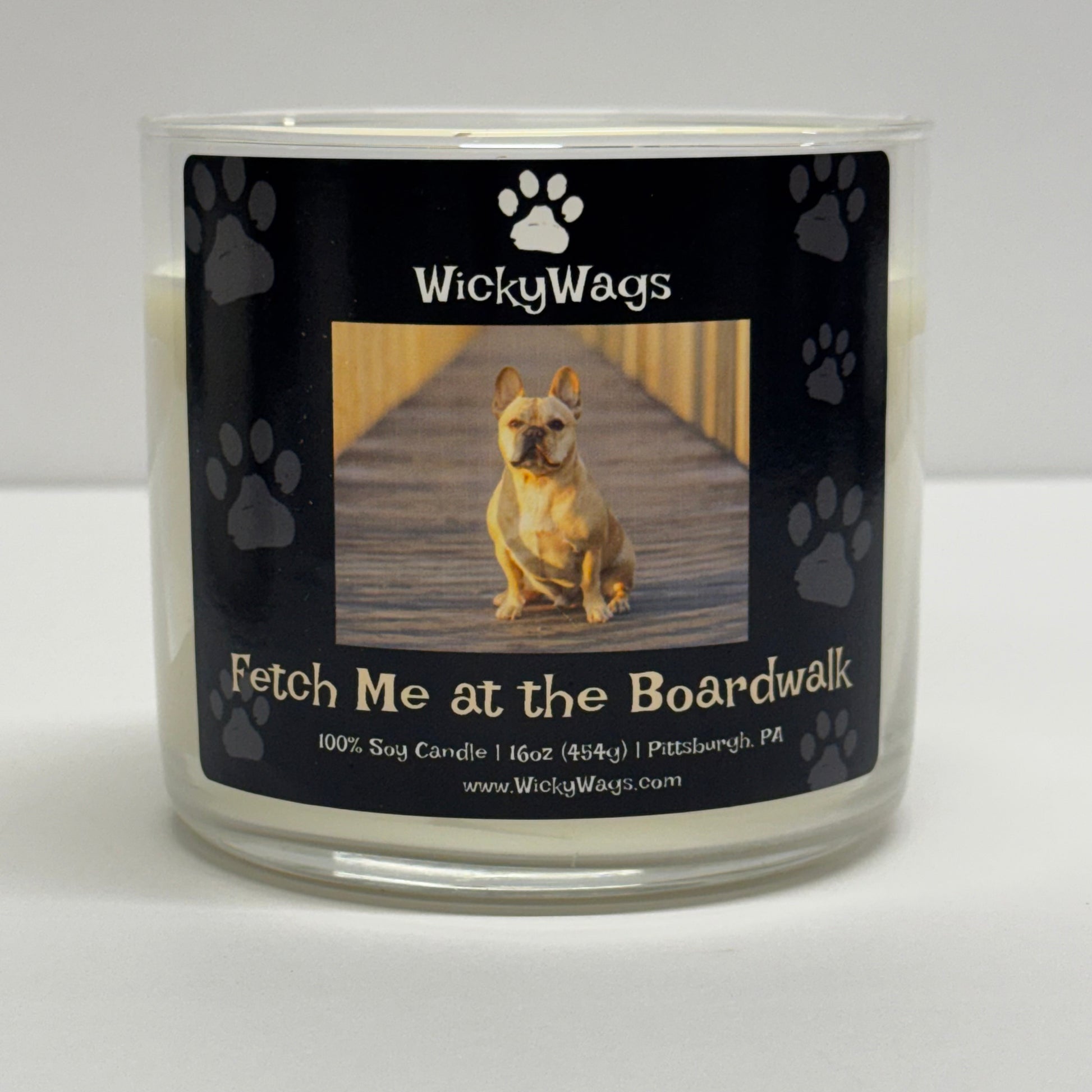 WickyWags candle with a dog on the label against a white background