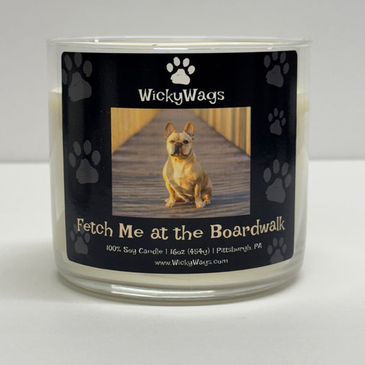 WickyWags candle with a dog on the label against a white background